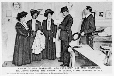 Arrest of Mrs Pankhurst, Miss Pankhurst and Mrs Drummond. Mr. Jarvis reading the warrant at Clements Inn, October 13, 1908 by English Photographer